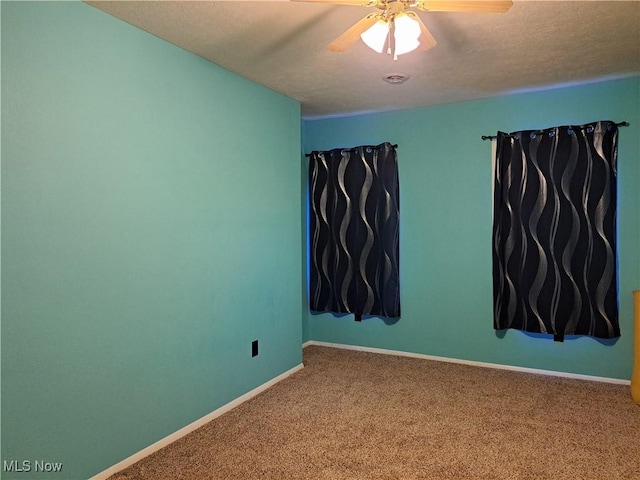 49197 John Tomcho Rd, Cumberland, OH 43732 - carpeted spare room with a ceiling fan and baseboards