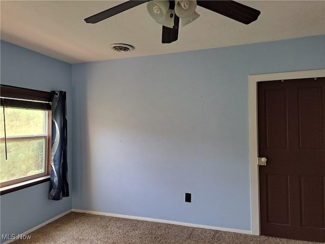 49197 John Tomcho Rd, Cumberland, OH 43732 - carpeted spare room with a ceiling fan and baseboards