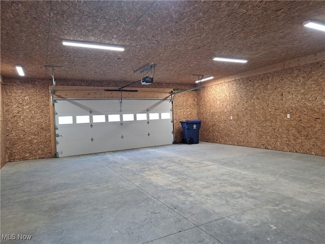 49197 John Tomcho Rd, Cumberland, OH 43732 - garage with a garage door opener