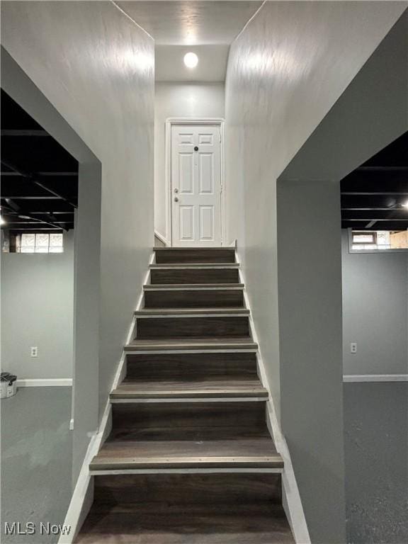 4399 W 57th St, Cleveland, OH 44144 - staircase featuring baseboards and a wealth of natural light