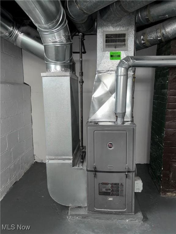 4399 W 57th St, Cleveland, OH 44144 - utility room featuring visible vents
