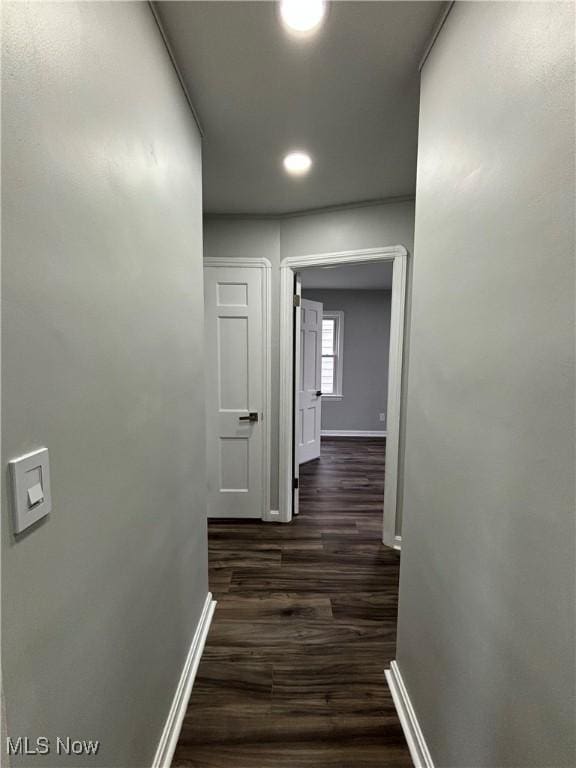 4399 W 57th St, Cleveland, OH 44144 - hallway with recessed lighting, baseboards, and dark wood-style floors