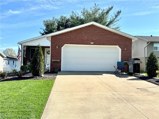 ranch-style house with driveway, a front lawn, an attached garage, and brick siding