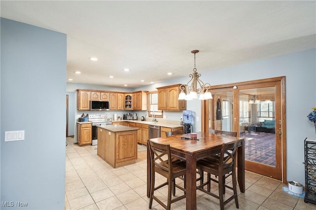 4054 Sacramento Blvd, Medina, OH 44256 - dining space featuring light tile patterned floors, recessed lighting, and an inviting chandelier