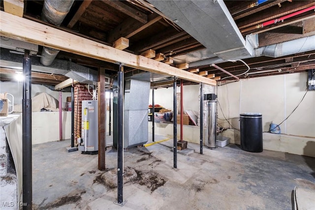 unfinished basement featuring water heater