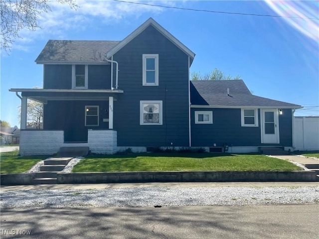 353 N 11th St, Coshocton, OH 43812 - view of front of home with a front yard, a porch, and roof with shingles