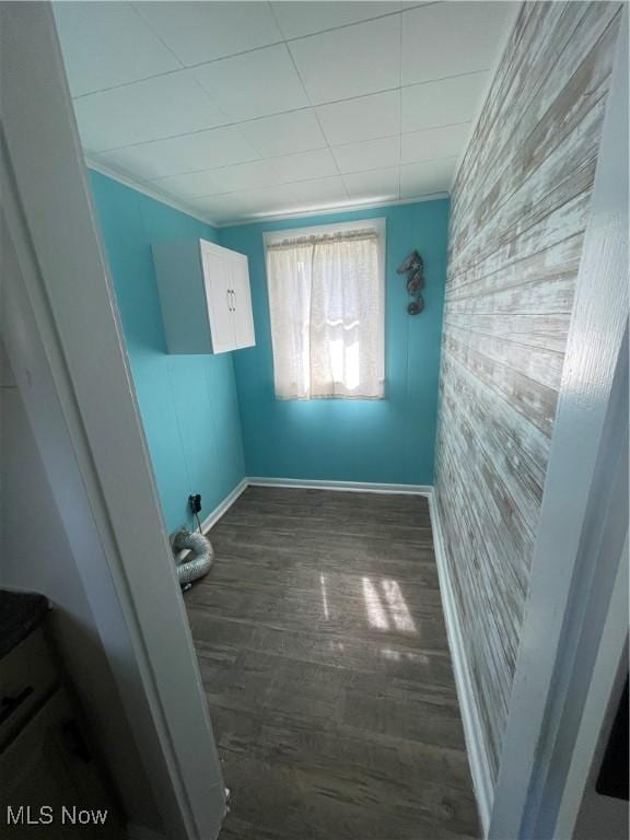 353 N 11th St, Coshocton, OH 43812 - unfurnished room featuring an accent wall, baseboards, and wood finished floors
