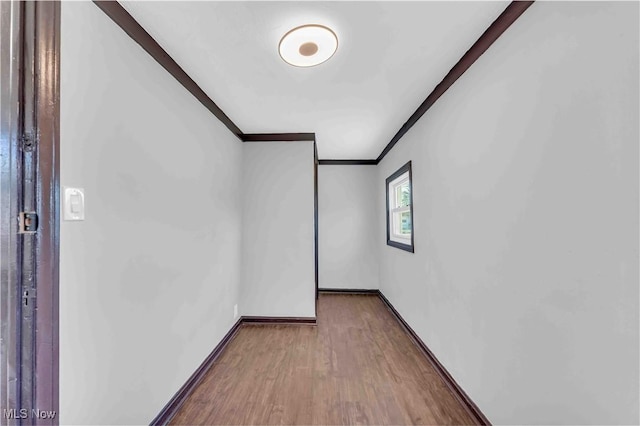 135 W Bagley Rd, Berea, OH 44017 - empty room featuring ornamental molding, wood finished floors, and baseboards