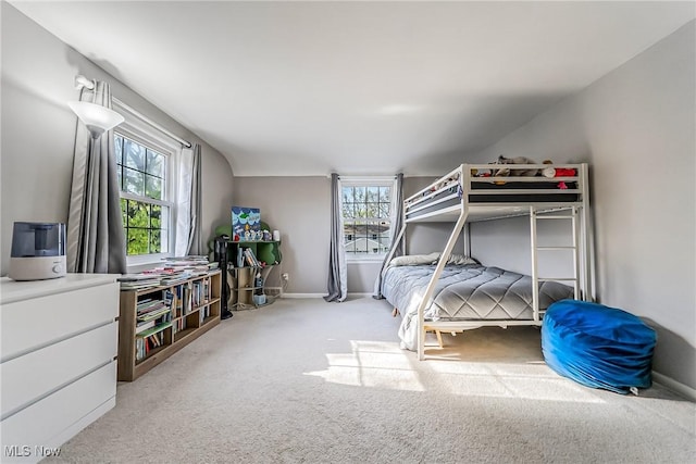 carpeted bedroom with baseboards