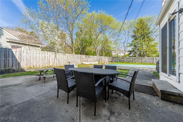 view of patio / terrace featuring a fenced backyard and outdoor dining area