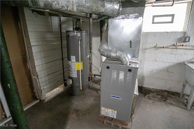 utility room featuring gas water heater