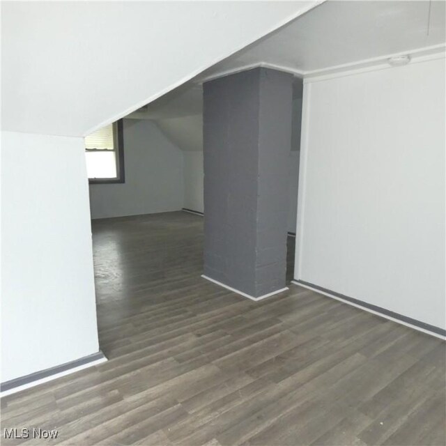 10921 Dove Ave, Cleveland, OH 44105 - additional living space with vaulted ceiling and wood finished floors