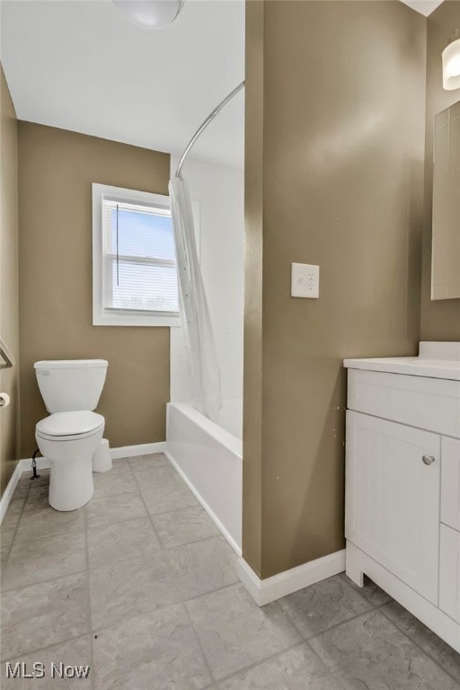 340 53rd St SW, Canton, OH 44706 - bathroom featuring vanity, toilet, marble finish floor, and baseboards