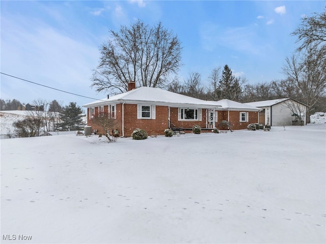 340 53rd St SW, Canton, OH 44706 - view of front of home with a chimney and brick siding