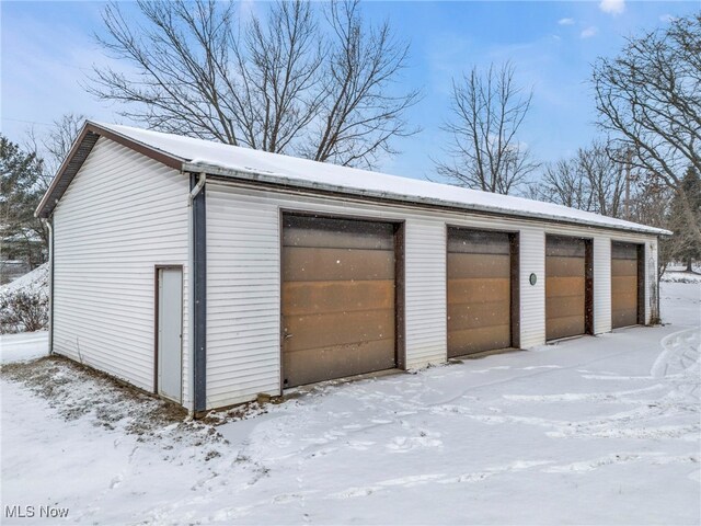 340 53rd St SW, Canton, OH 44706 - snow covered garage with a detached garage