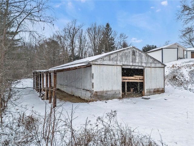 340 53rd St SW, Canton, OH 44706 - snow covered structure featuring an outbuilding