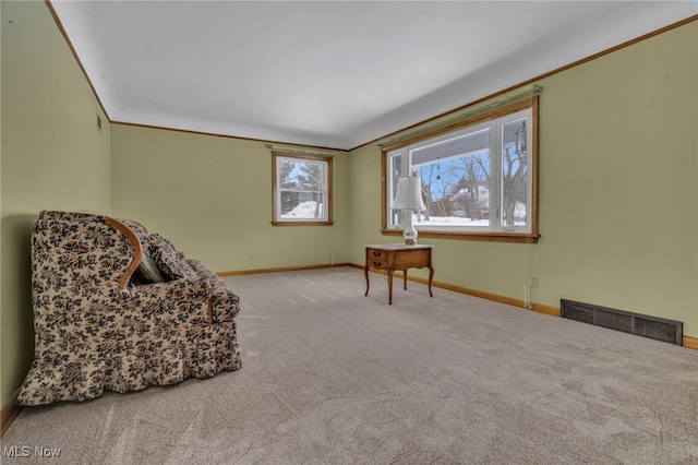 340 53rd St SW, Canton, OH 44706 - living area featuring crown molding, visible vents, carpet floors, and baseboards