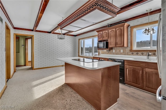 340 53rd St SW, Canton, OH 44706 - kitchen with wallpapered walls, light countertops, black appliances, a sink, and baseboards