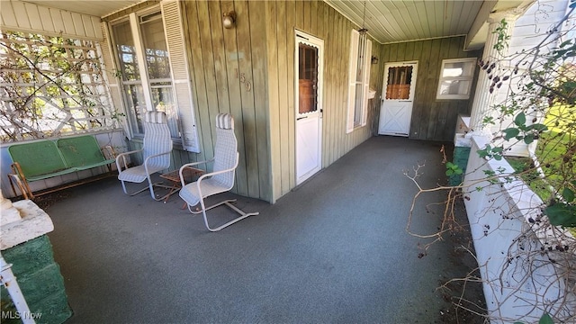 view of patio featuring a porch