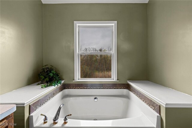 full bath with a garden tub