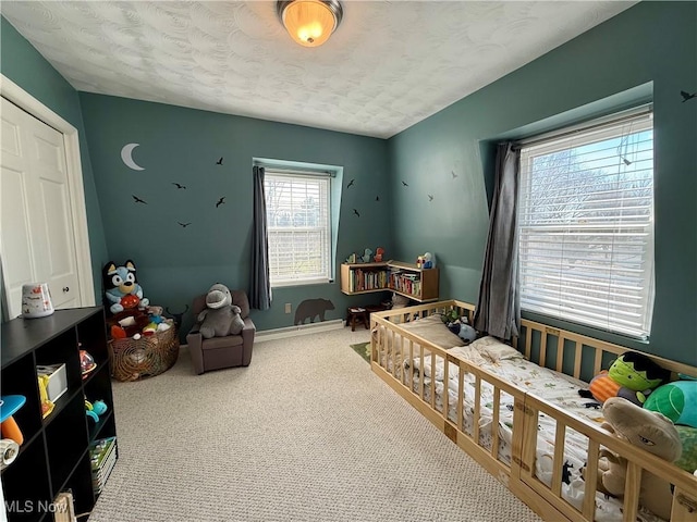 7455 Brushmore Ave NW, North Canton, OH 44720 - carpeted bedroom with a textured ceiling