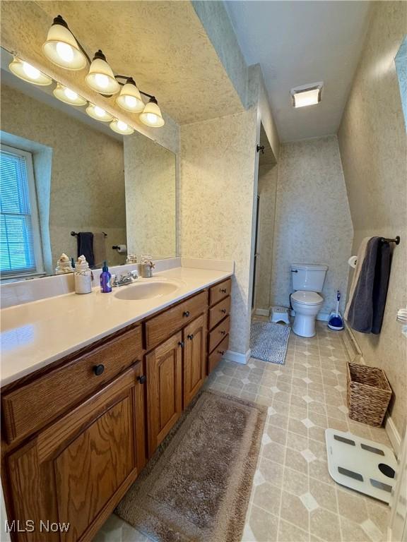 7455 Brushmore Ave NW, North Canton, OH 44720 - full bath featuring vanity and a shower stall