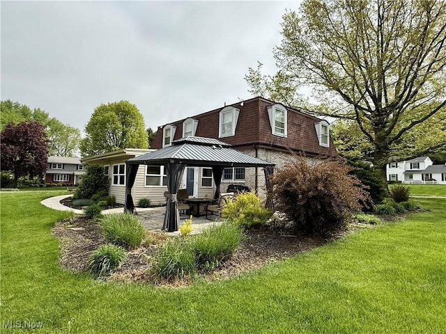 7455 Brushmore Ave NW, North Canton, OH 44720 - rear view of property with a gazebo, a patio area, a lawn, and mansard roof