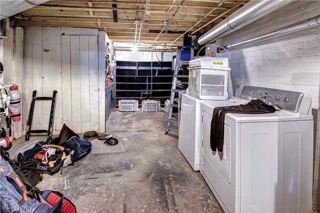 laundry room with independent washer and dryer and laundry area