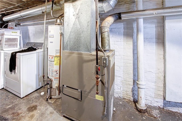 utility room featuring gas water heater, heating unit, and independent washer and dryer