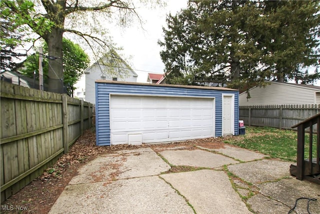 detached garage with fence