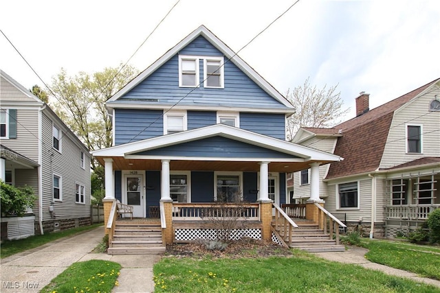 traditional style home with covered porch