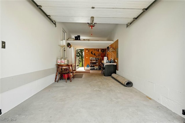 garage featuring a garage door opener