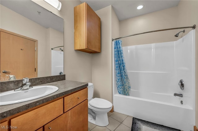 bathroom featuring shower / tub combo with curtain, toilet, tile patterned flooring, and vanity