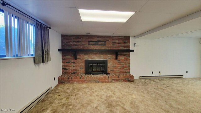 813 Brentwood Dr, Belpre, OH 45714 - unfurnished living room with carpet floors, a baseboard radiator, and a brick fireplace