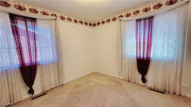 813 Brentwood Dr, Belpre, OH 45714 - carpeted empty room featuring baseboards and visible vents