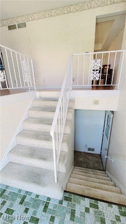 813 Brentwood Dr, Belpre, OH 45714 - staircase featuring visible vents