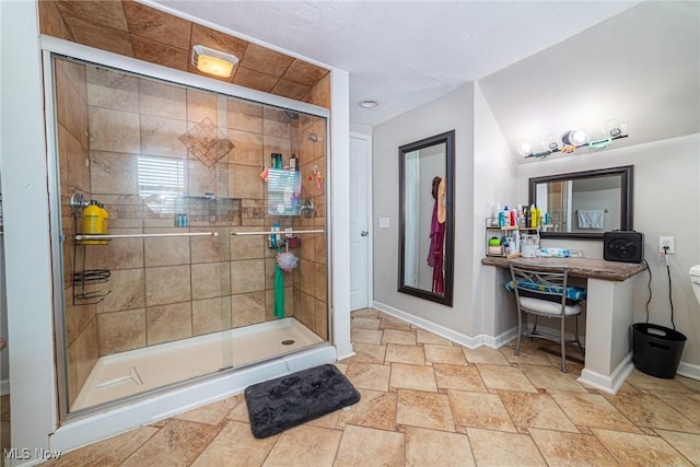 1741 Cambridge Rd, Coshocton, OH 43812 - bathroom featuring baseboards, a stall shower, toilet, and stone finish floor