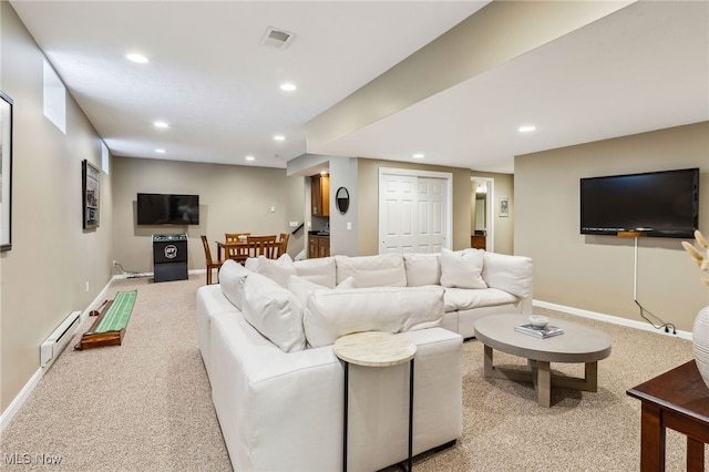 living area with carpet, visible vents, recessed lighting, and baseboard heating