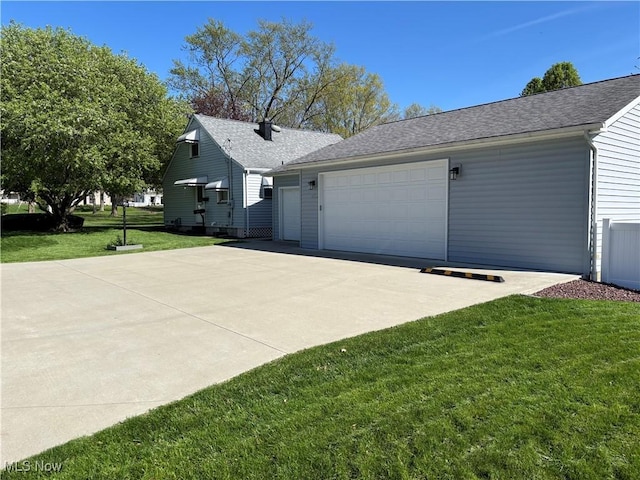 view of home's exterior with a lawn, central AC, and a shingled roof