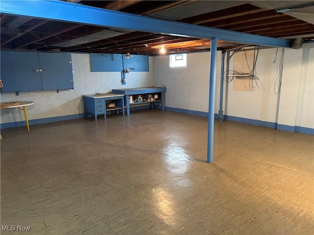 basement featuring tile patterned floors