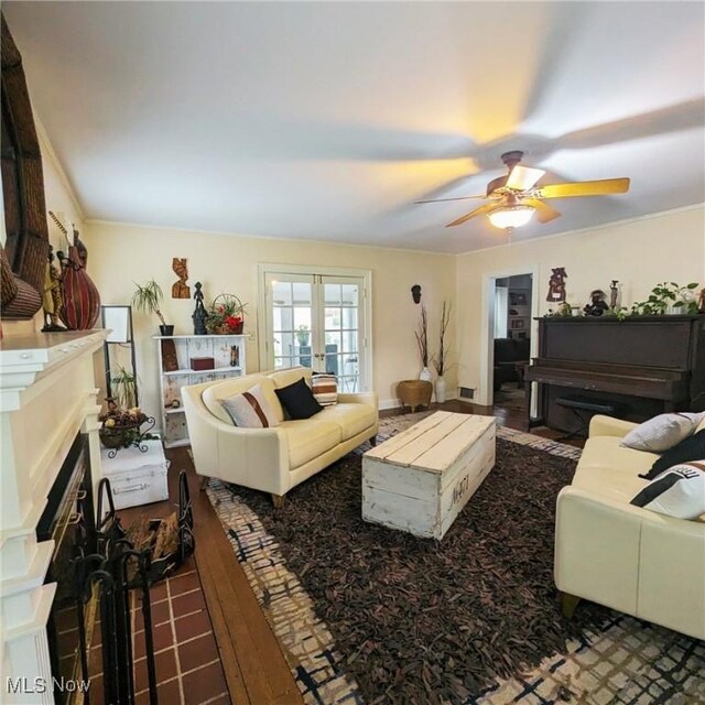 557 Cambridge Rd, Coshocton, OH 43812 - living room featuring ceiling fan, french doors, and a fireplace