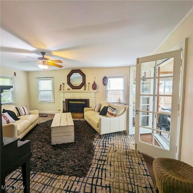557 Cambridge Rd, Coshocton, OH 43812 - living room with ceiling fan and a fireplace