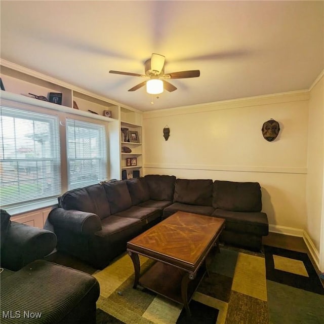 557 Cambridge Rd, Coshocton, OH 43812 - living area featuring crown molding, a ceiling fan, and built in features
