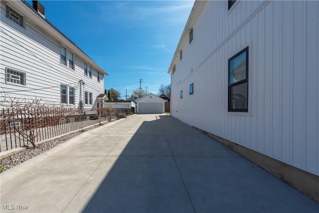 exterior space with concrete driveway