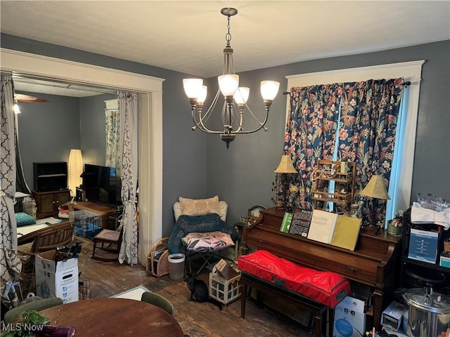 1125 Lafayette St, Zanesville, OH 43701 - sitting room with a chandelier and wood finished floors
