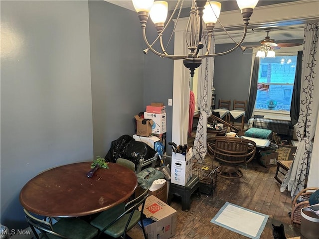 1125 Lafayette St, Zanesville, OH 43701 - dining area with ceiling fan with notable chandelier and wood-type flooring