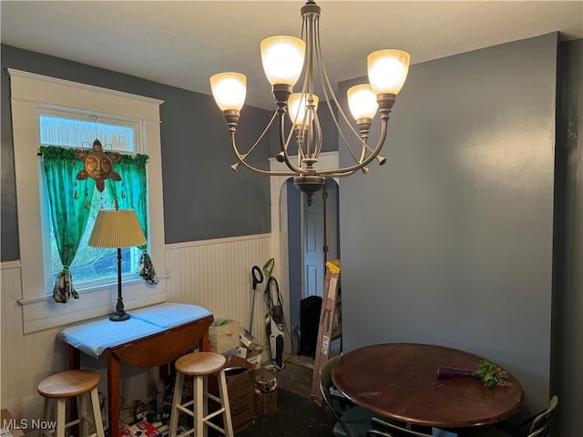 1125 Lafayette St, Zanesville, OH 43701 - dining area featuring a chandelier and wainscoting