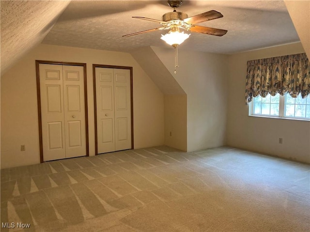 312 Chesapeake Cv, Painesville, OH 44077 - bonus room with light carpet, a textured ceiling, a ceiling fan, and lofted ceiling
