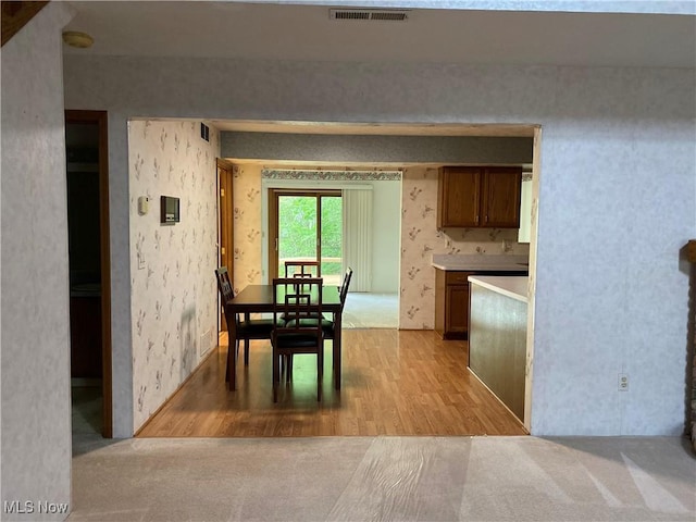 312 Chesapeake Cv, Painesville, OH 44077 - dining space with light wood finished floors