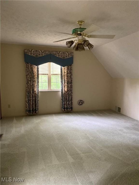 312 Chesapeake Cv, Painesville, OH 44077 - bonus room featuring a ceiling fan, carpet floors, and lofted ceiling